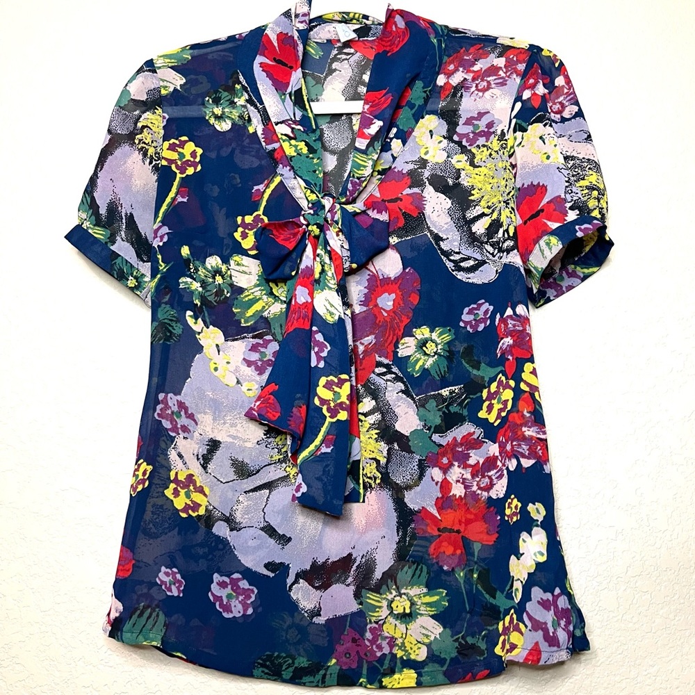 Floral Blouse from GO International. V neck with tie. Sheer Size Medium